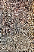 Angkor Wat temple, the bas-reliefs of the third enclosure. North Gallery Western Part Battle between the gods and the demons.